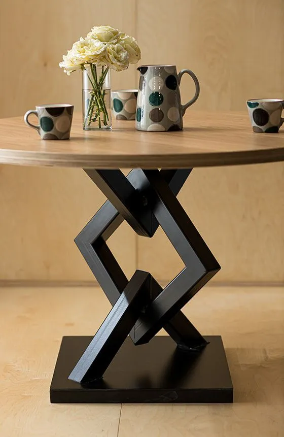 Handcrafted metal furniture combining steel and wood